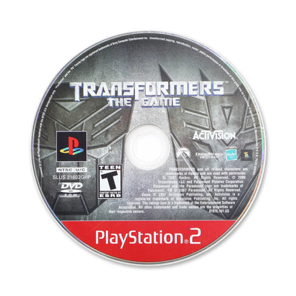 Transformers: The Game [Greatest Hits] for Sony PlayStation 2 - Disc front with label - Game only.