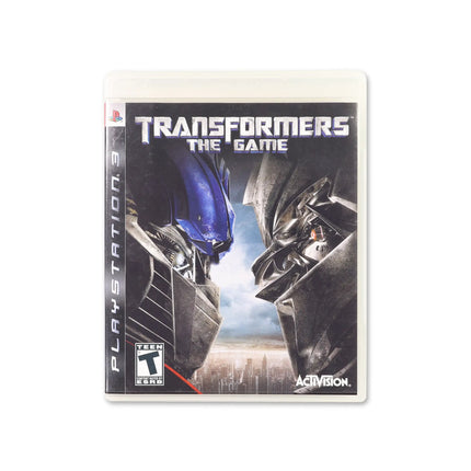 Transformers: The Game for PlayStation 3 - Box front - Complete in box or box and game.